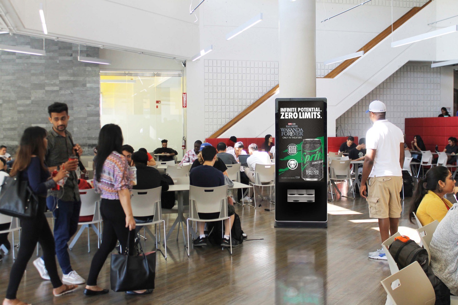 Campus dining hall showing a Dropsignal ad