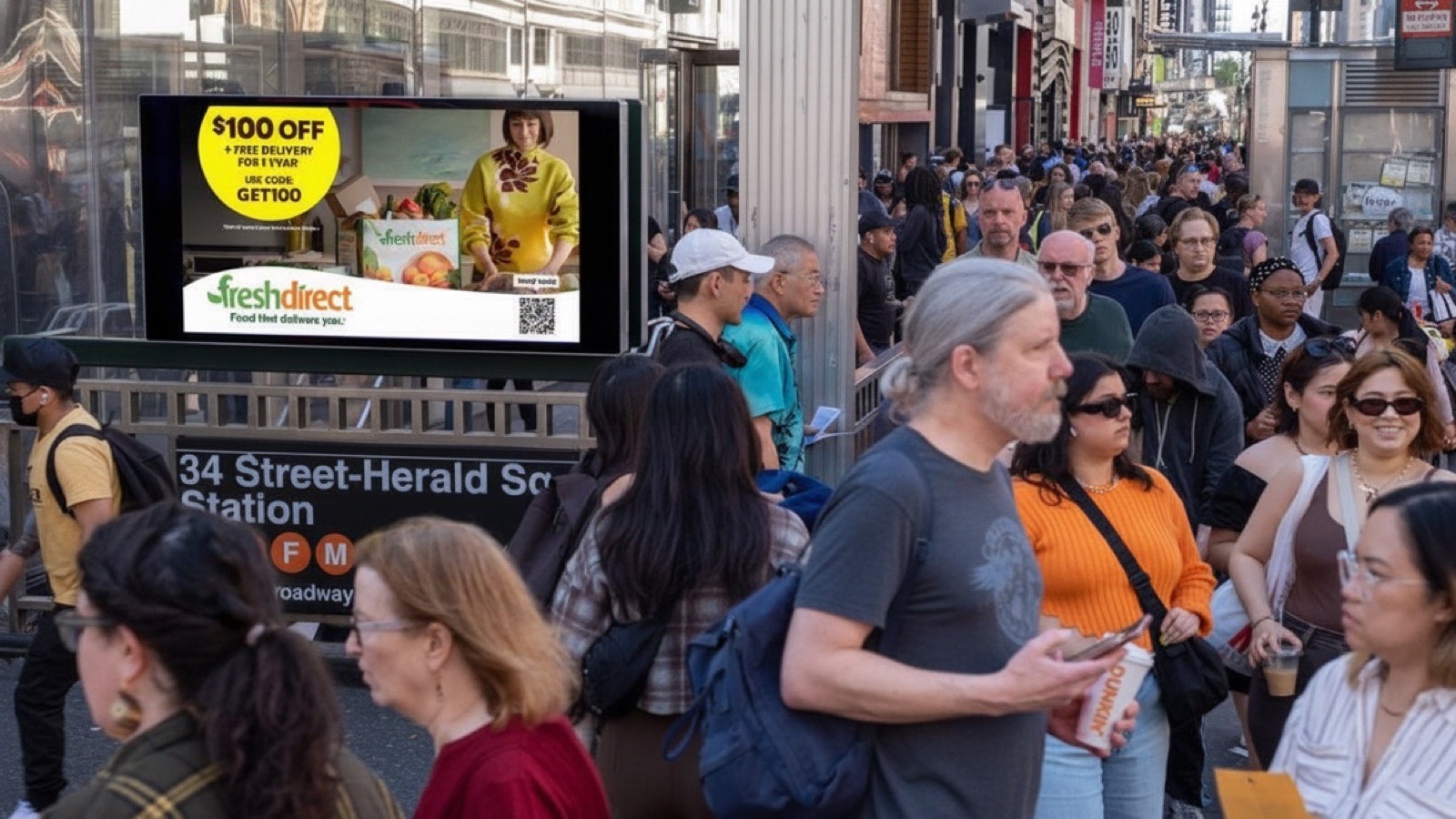 Subway entrance, Herald Square showing a Dropsignal ad